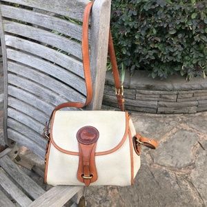 Dooney & Bourke Cream AWL Small Essex Shoulder Bag